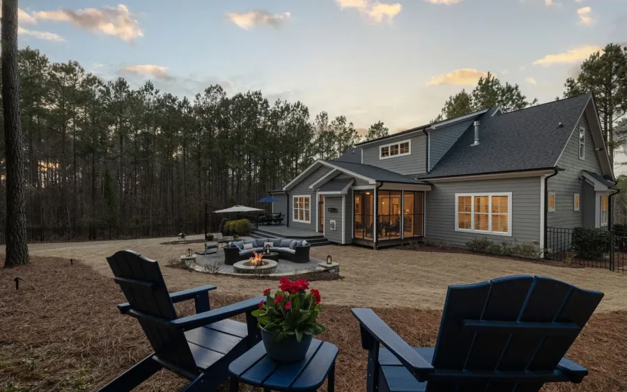 Outdoor living inspiration for Powell: a backyard at golden hour with a paver fire pit terrace